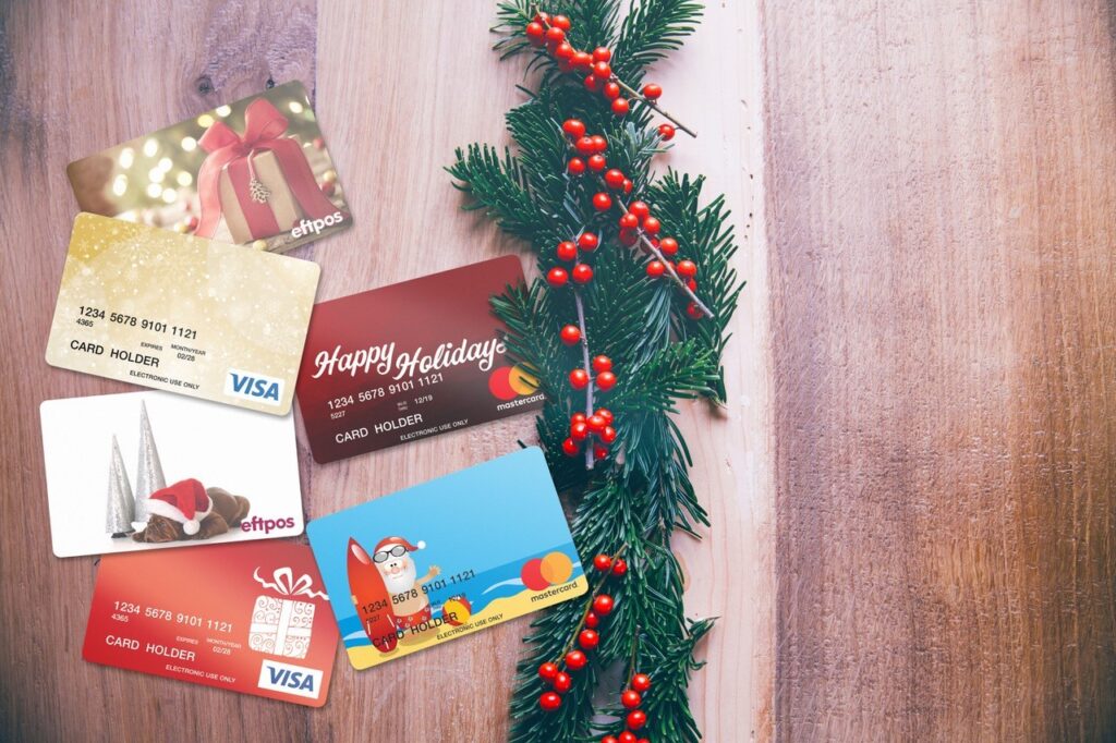 holly with preapid mastercard and visa christmas cards