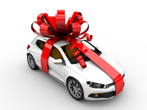new car with red gift bow